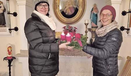 Die Feiern um den Adventkranz verbinden katholische und evangelische Familien. 